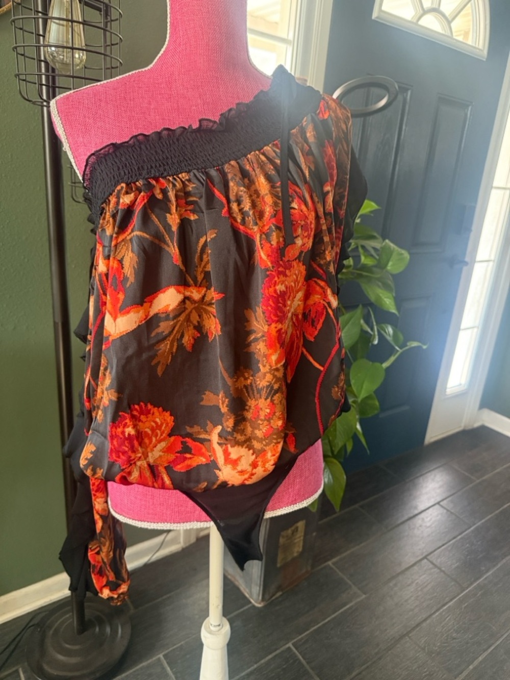 Free People Black Smocked Waist Skirt with Rust Floral Accents bodysuit.